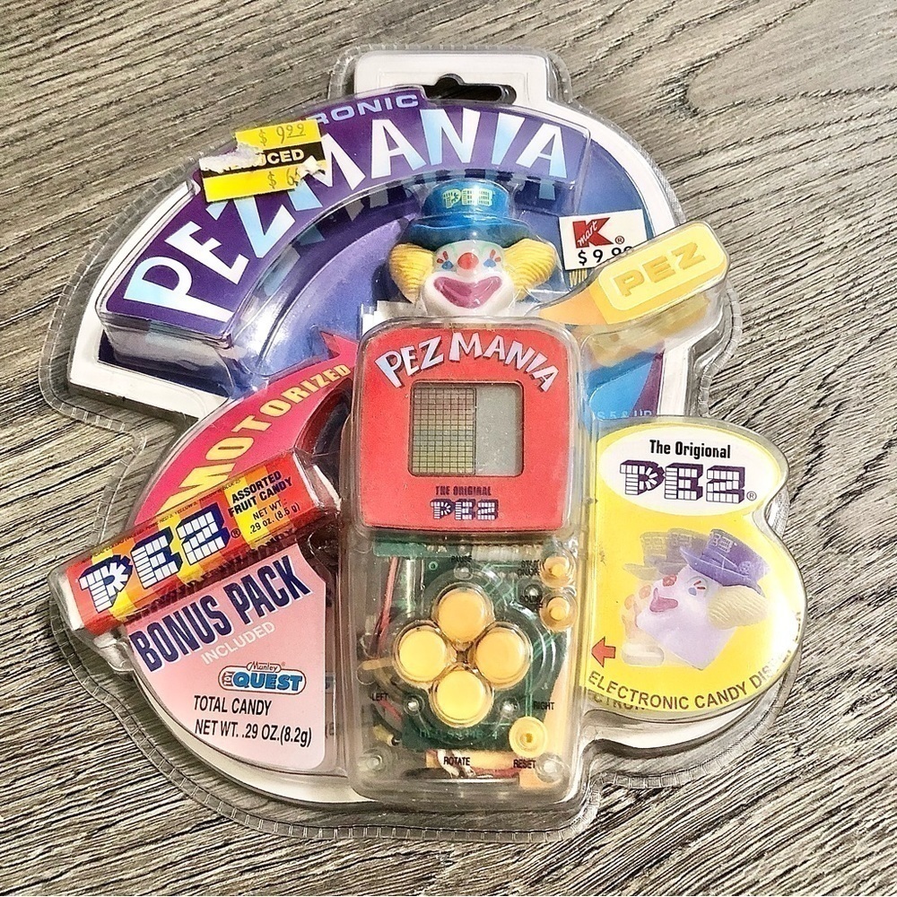TOY QUEST Pez mania electronic Video game handheld 1999 Manley NIP Sealed